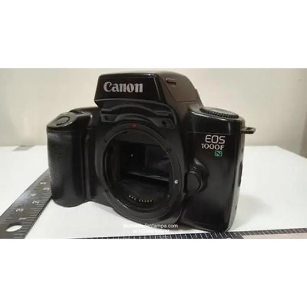 Canon EOS 1000F N 35mm SLR film camera body in black.